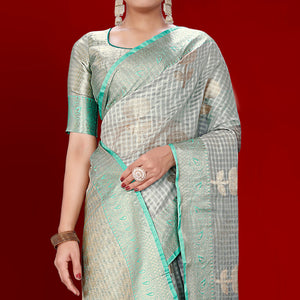 grey-floral-woven-organza-saree-with-tassels