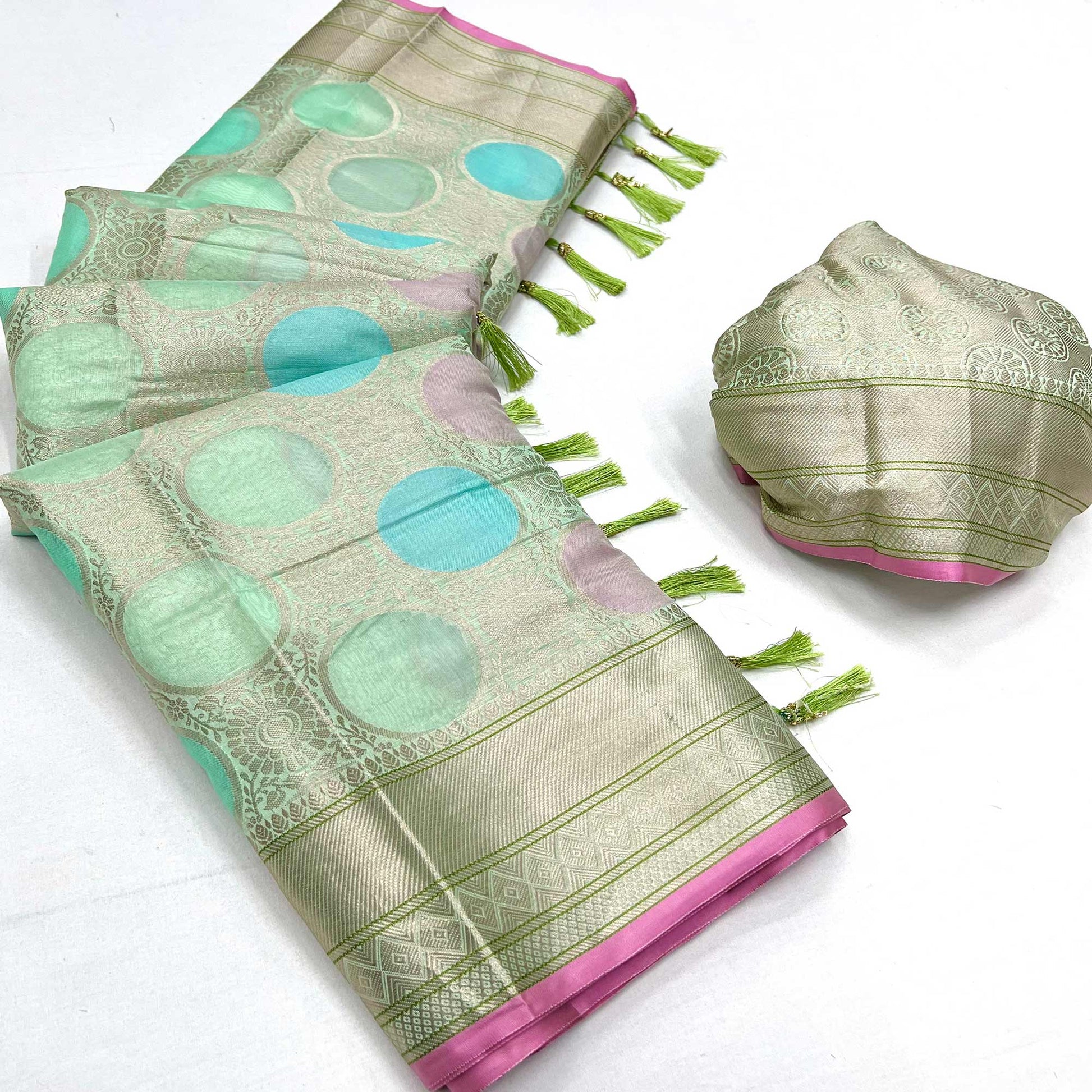 green-floral-woven-organza-saree-with-tassels