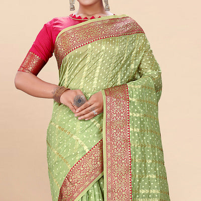 green-woven-organza-saree-with-tassels-19