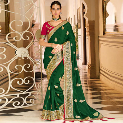 a-green-embroidered-vichitra-silk-saree-with-with-tassels