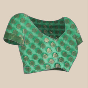 green-woven-organza-silk-saree-with-tassels-2