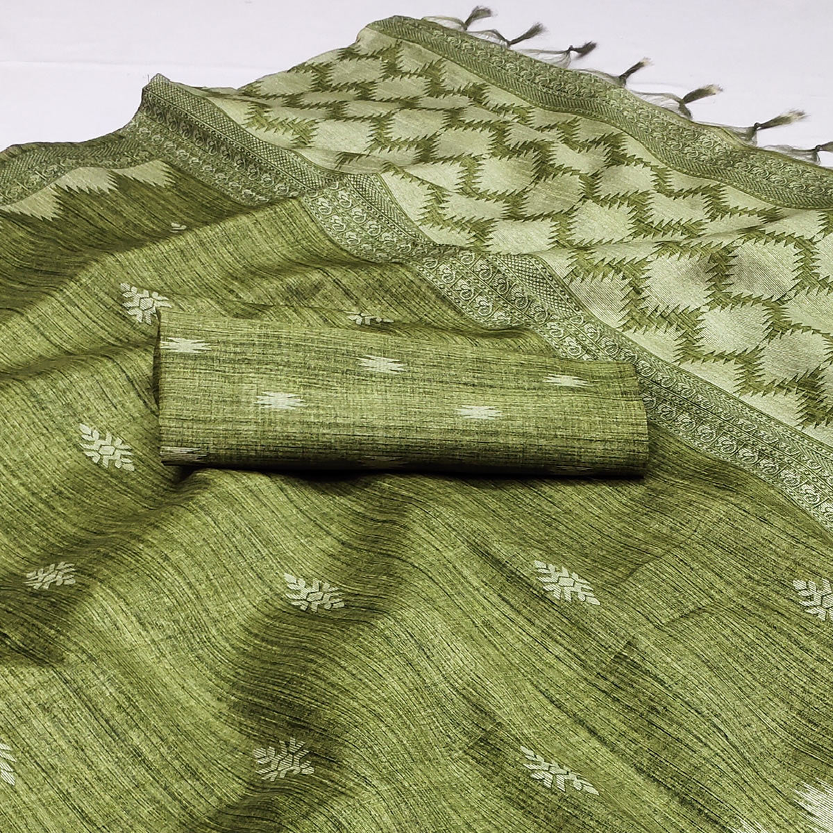 green-printed-tussar-silk-saree-with-tassels