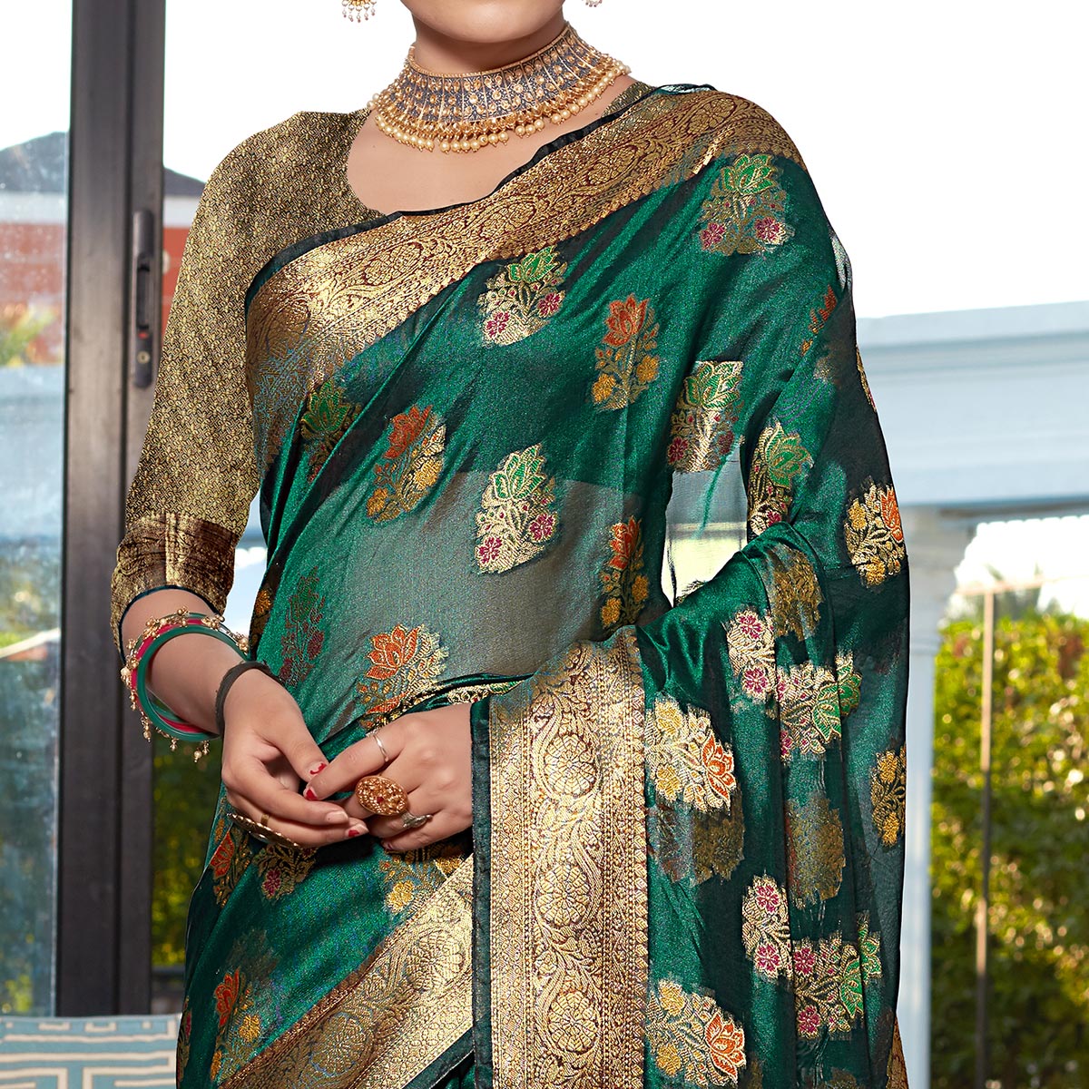 a-green-floral-woven-organza-saree