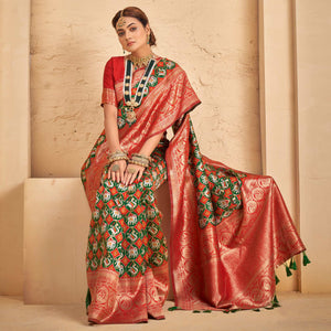 green-woven-patola-art-silk-saree-with-tassels