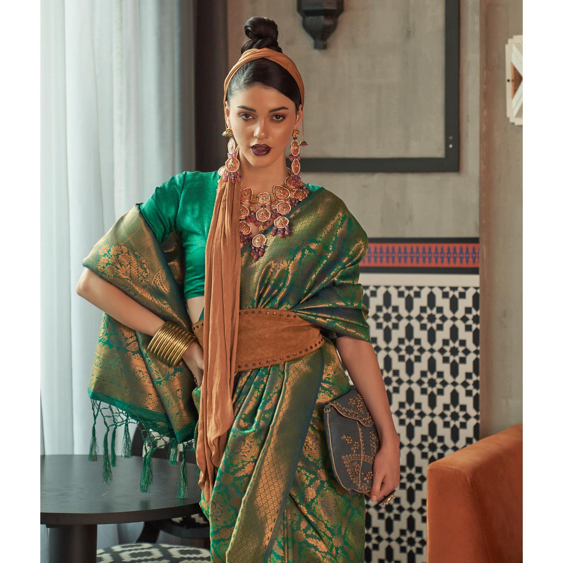 green-woven-art-silk-saree-with-tassels-16