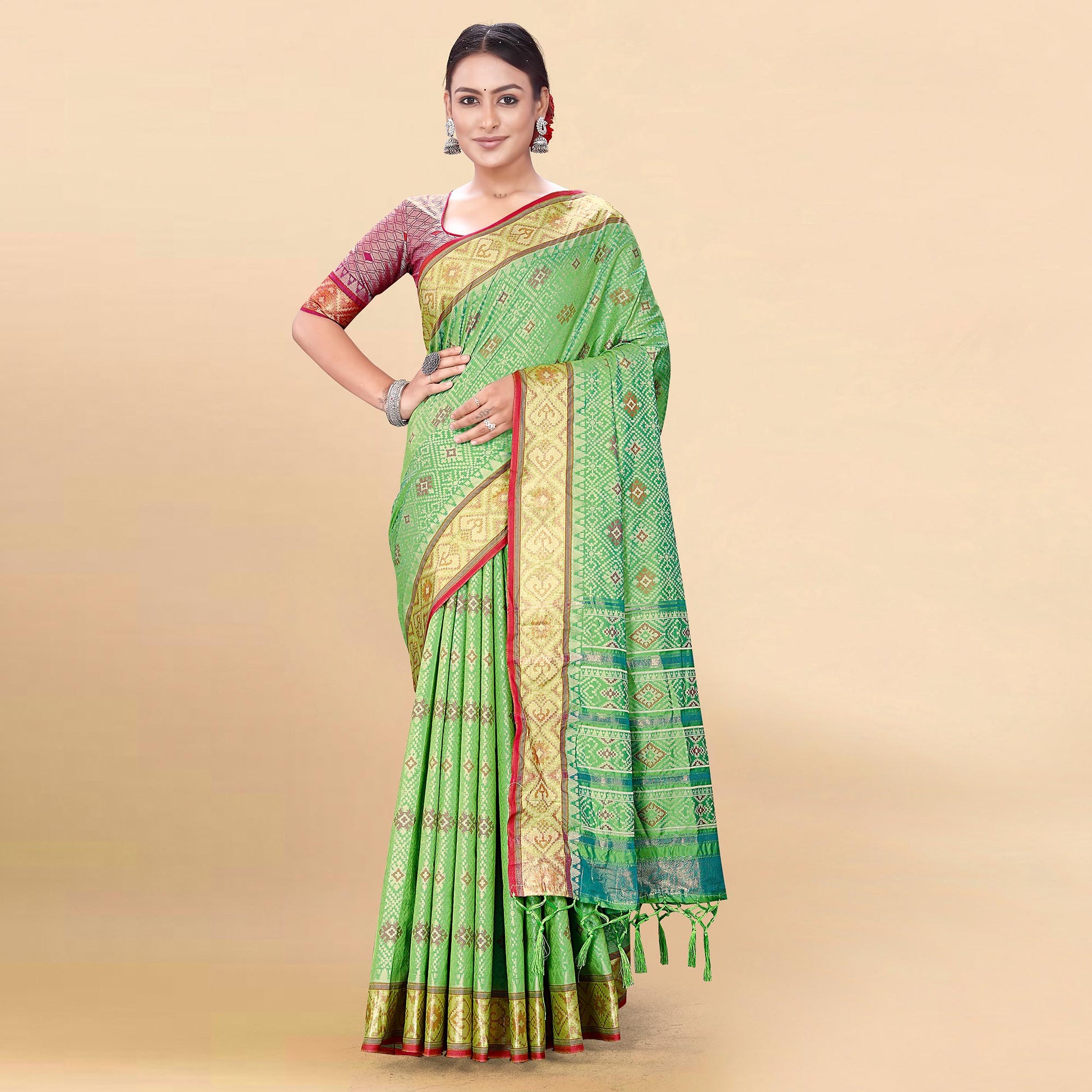 green-woven-patola-art-silk-saree-with-tassels-2