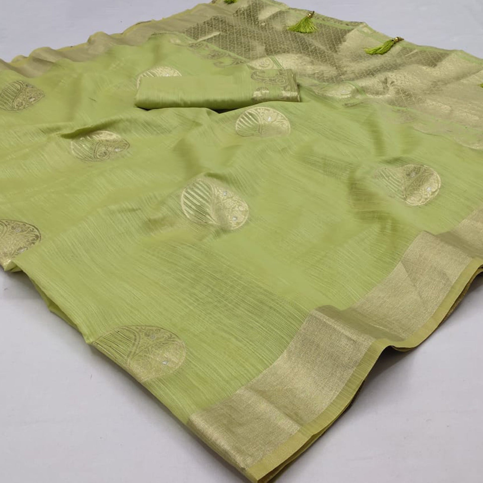 green-woven-art-silk-saree-with-tassels-6