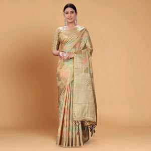 Chikoo Woven Organza Saree With Tassels