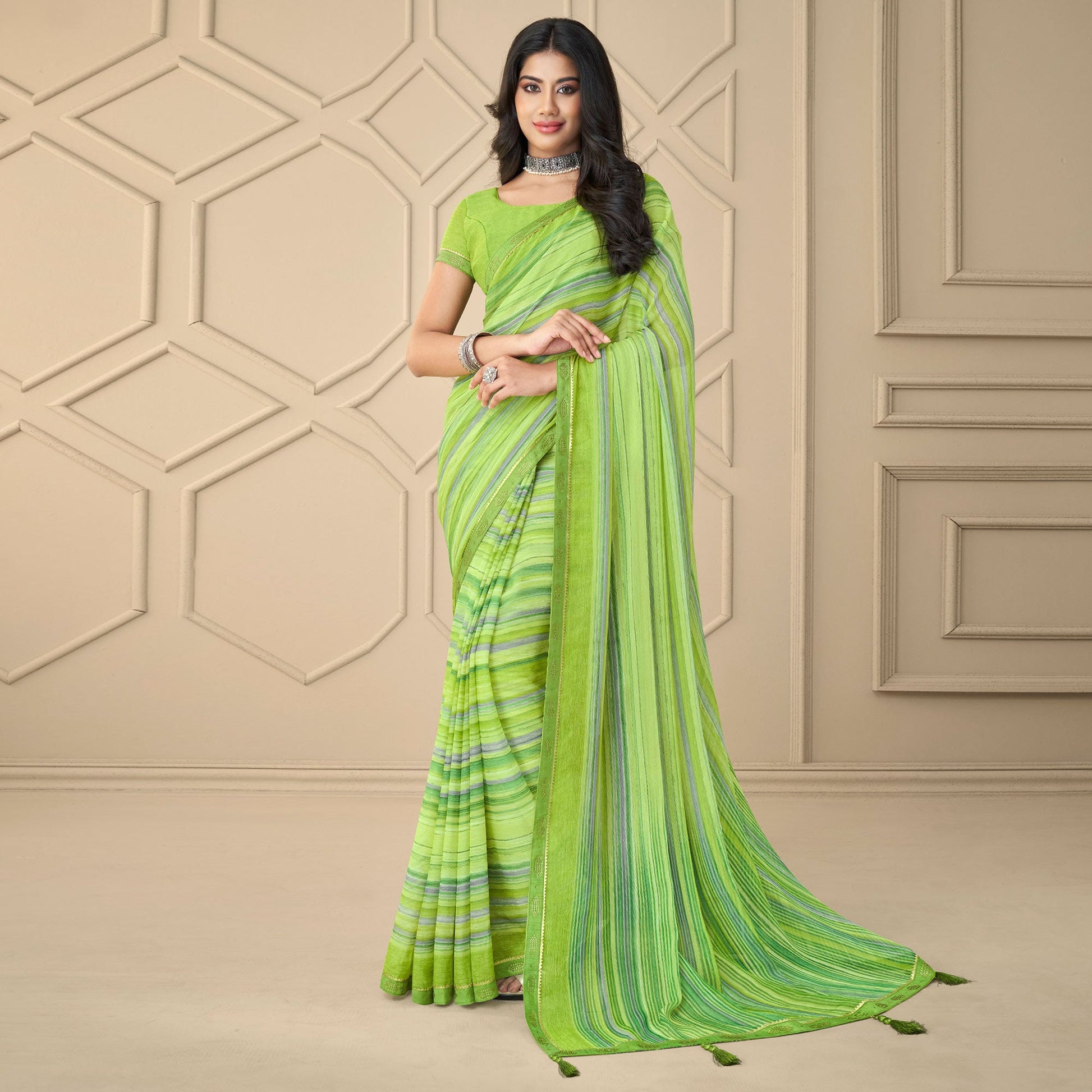 green-printed-chiffon-saree-with-tassels