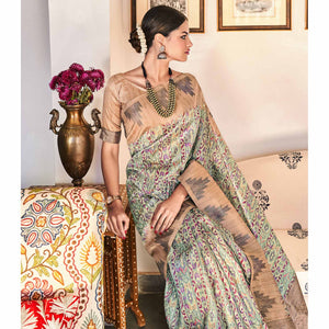 green-digital-printed-raw-silk-saree-with-tassels