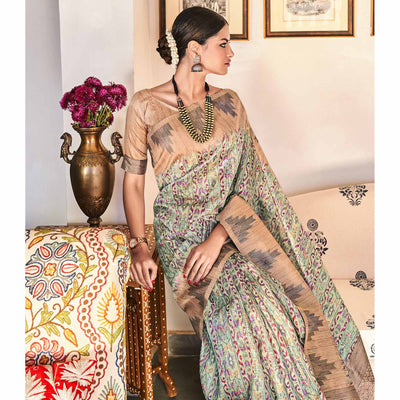 green-digital-printed-raw-silk-saree-with-tassels