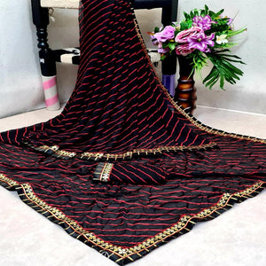 Flamboyant Black Colored Casual Printed Moss Georgette Saree