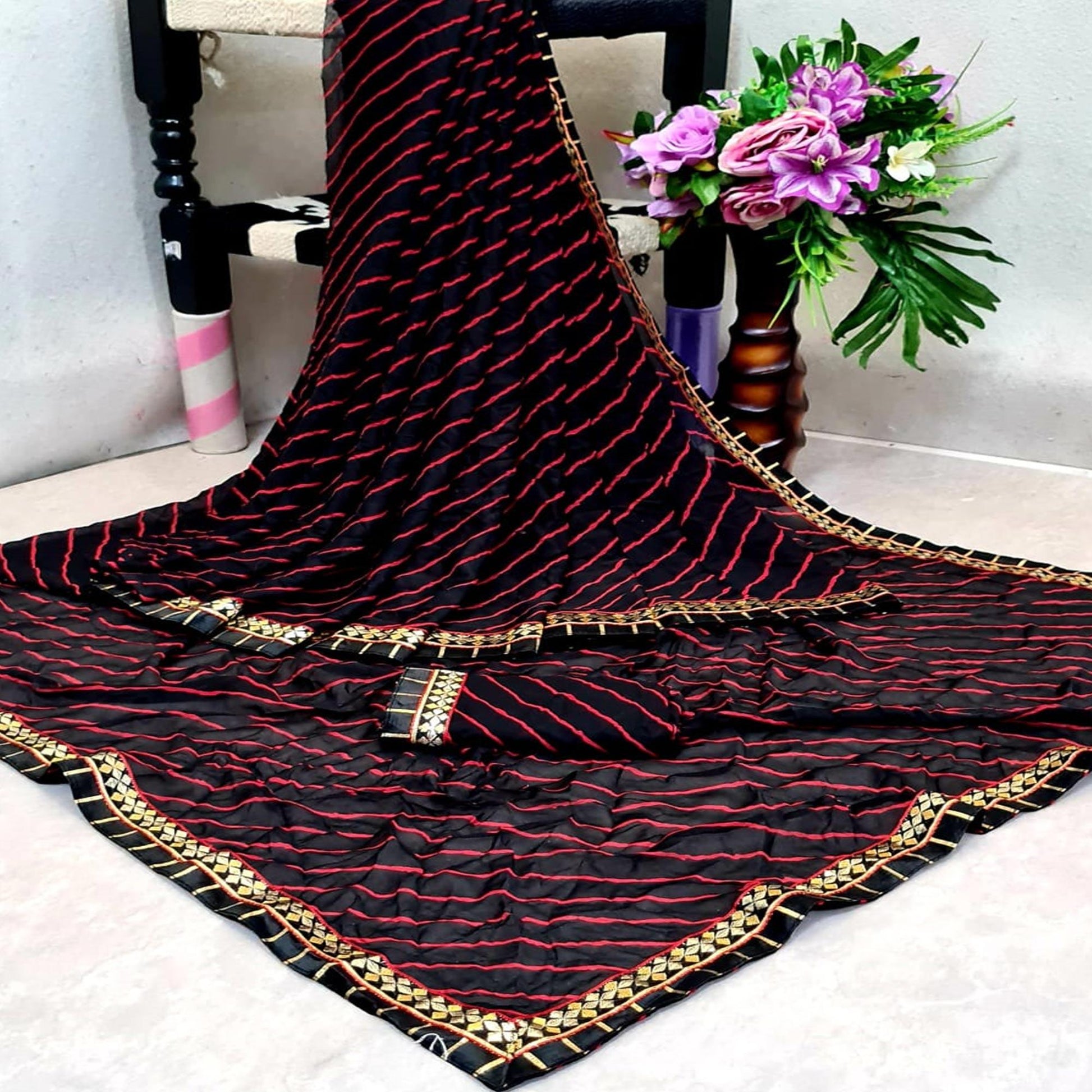Flamboyant Black Colored Casual Printed Moss Georgette Saree