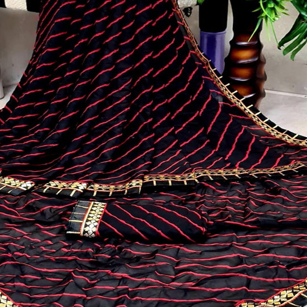 Flamboyant Black Colored Casual Printed Moss Georgette Saree