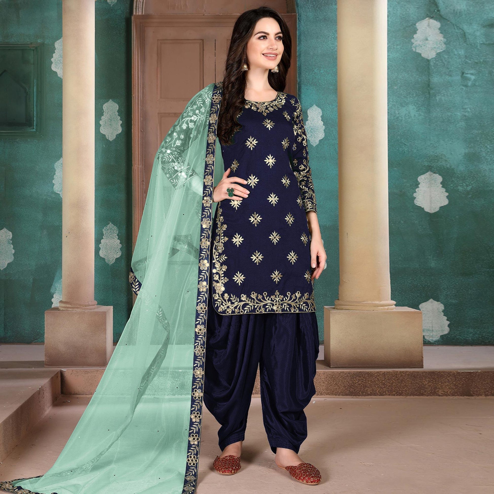Flamboyant Blue Colored Designer Partywear Embroidered Heavy Art Silk Patiala Suit