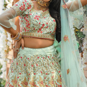 Flamboyant Blue Colored Wedding Wear Woven Silk Lehenga Choli