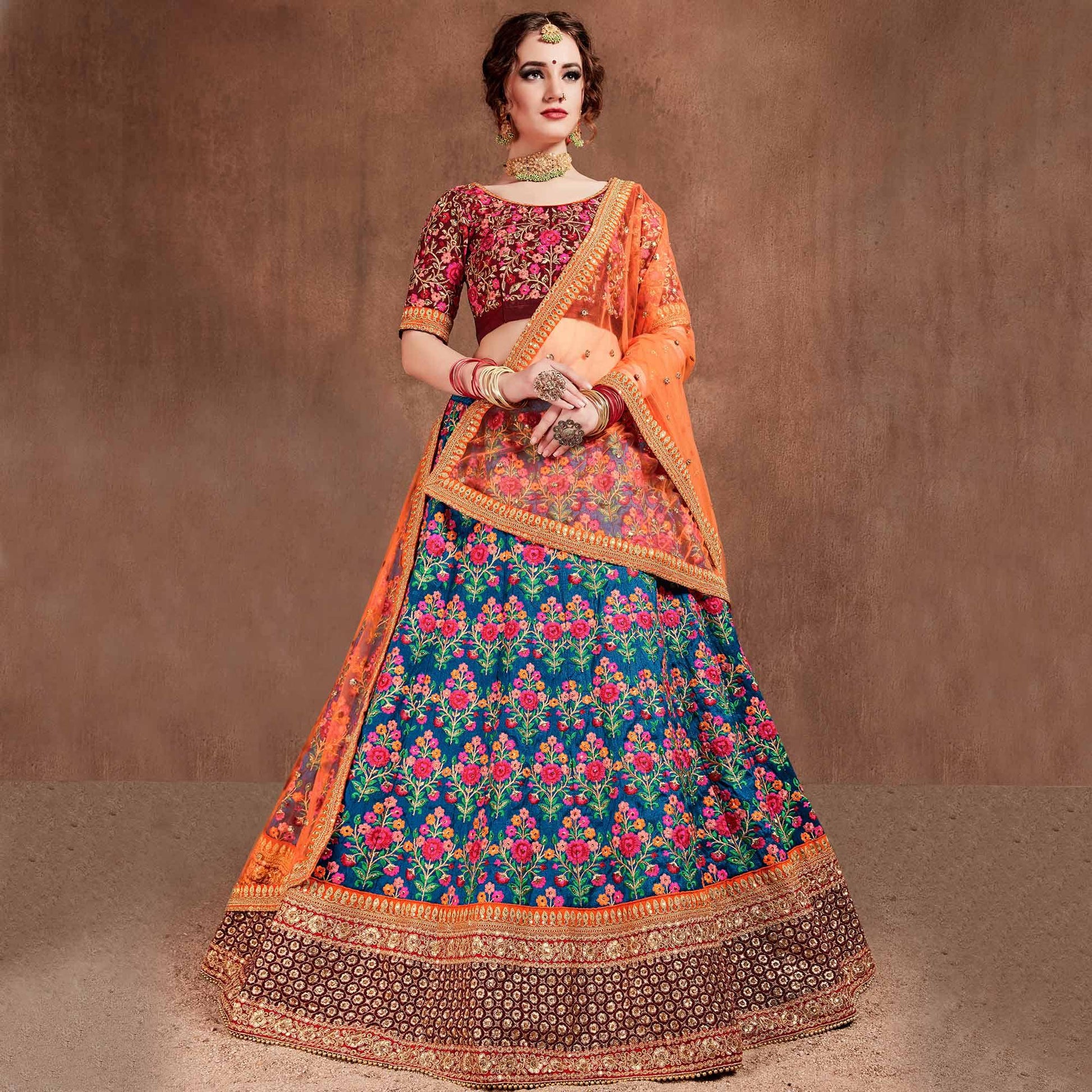 Flamboyant Blue-Red Colored Partywear Embroidered Mulberry Silk Lehenga Choli