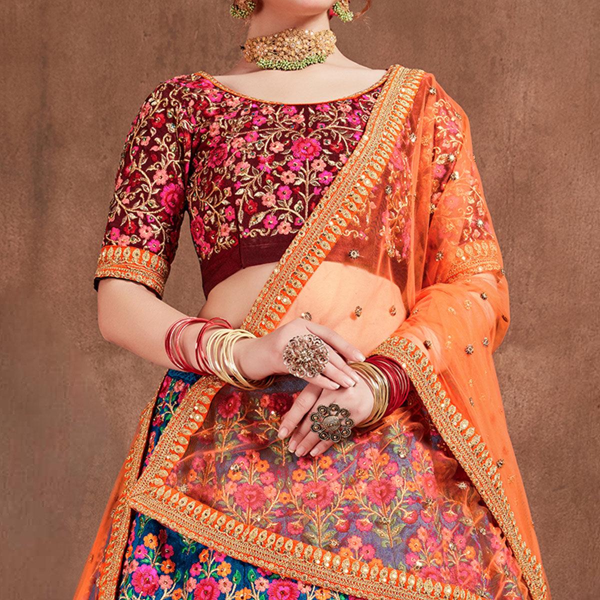 Flamboyant Blue-Red Colored Partywear Embroidered Mulberry Silk Lehenga Choli