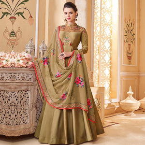 Flamboyant Chiku Colored Partywear Embroidered Silk Anarkali Suit