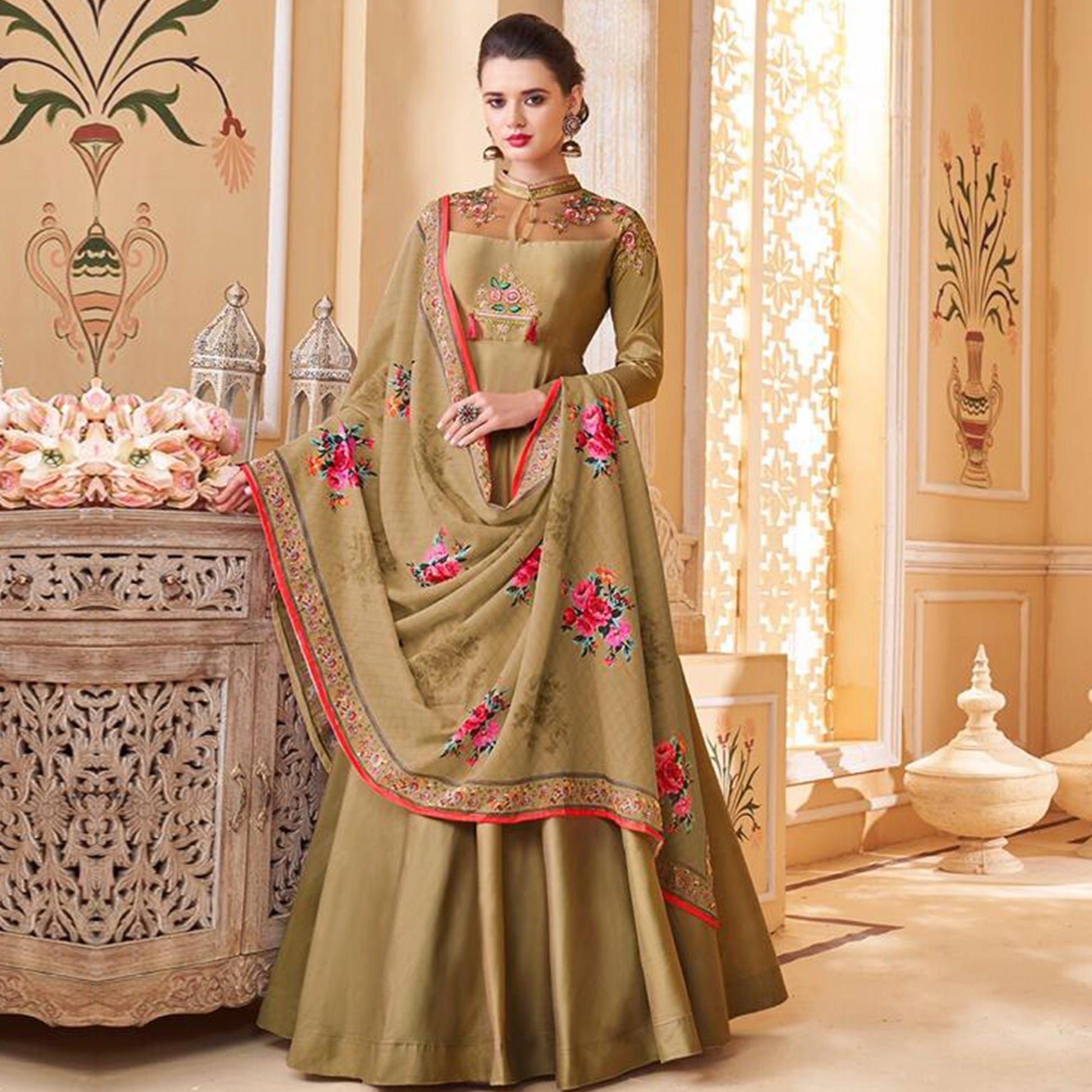 Flamboyant Chiku Colored Partywear Embroidered Silk Anarkali Suit