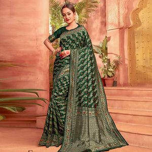 Flamboyant Dark Green Colored Festive Wear Woven Designer Silk Saree