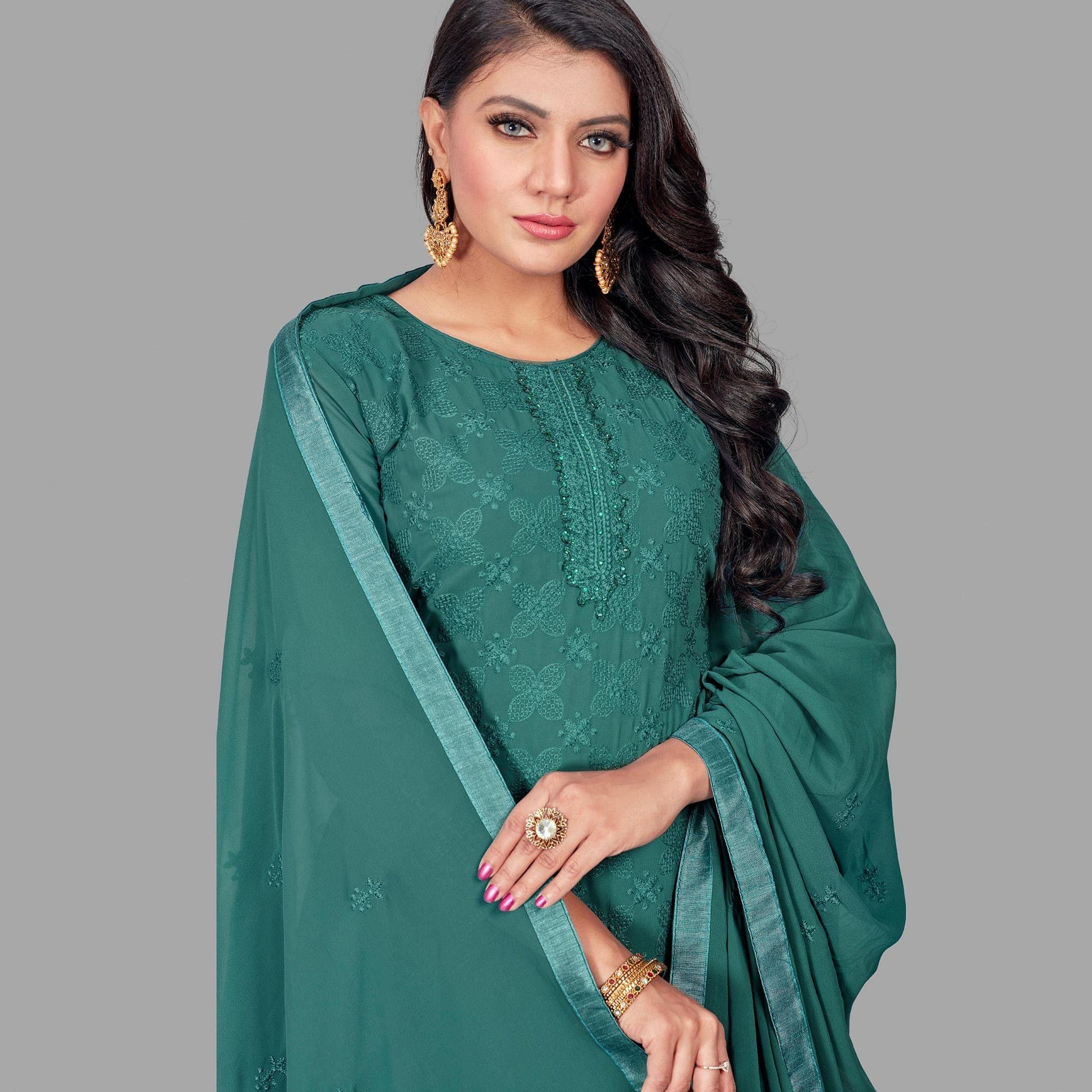 Flamboyant Dark Green Colored Partywear Embroidered Heavy Faux Georgette Palazzo Suit