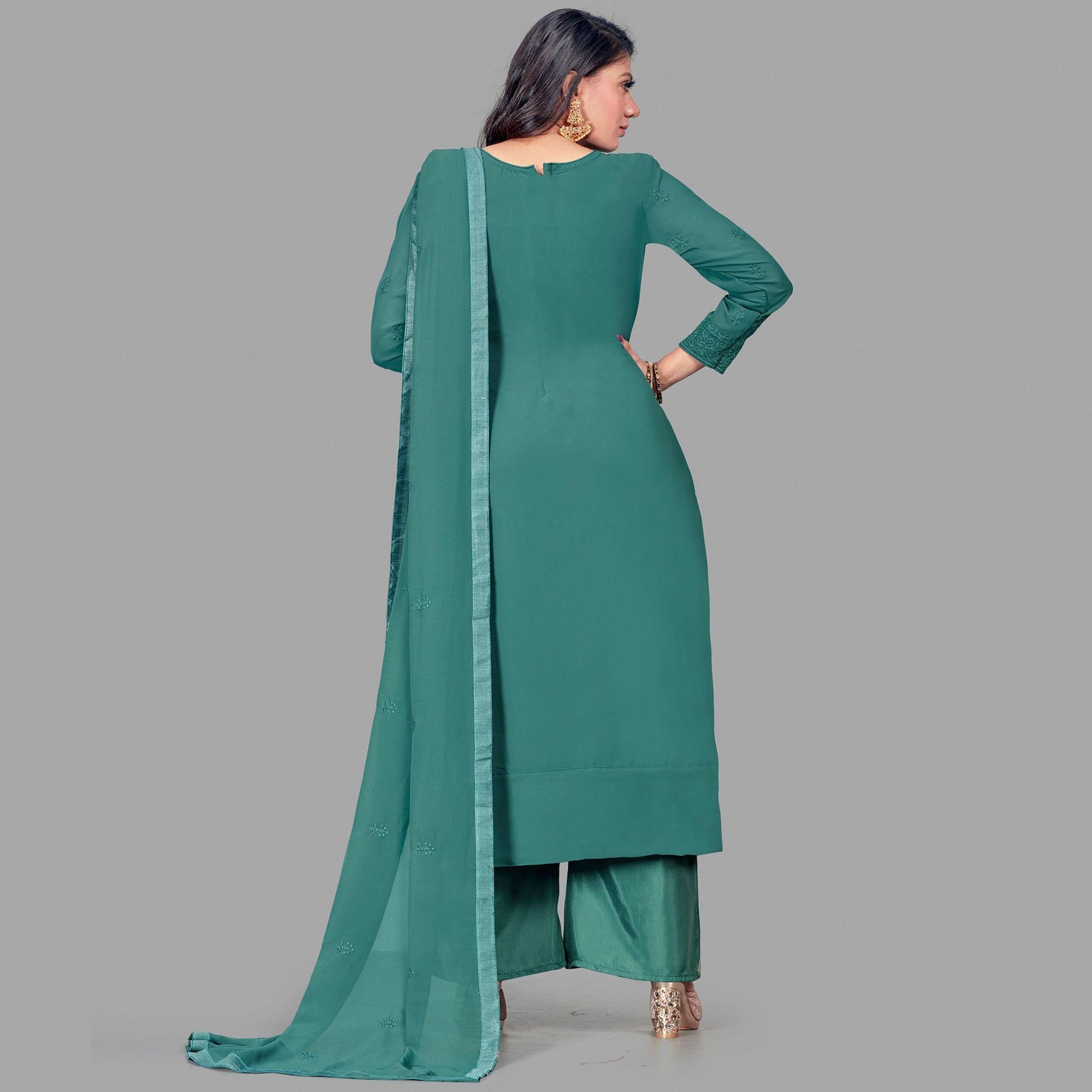 Flamboyant Dark Green Colored Partywear Embroidered Heavy Faux Georgette Palazzo Suit