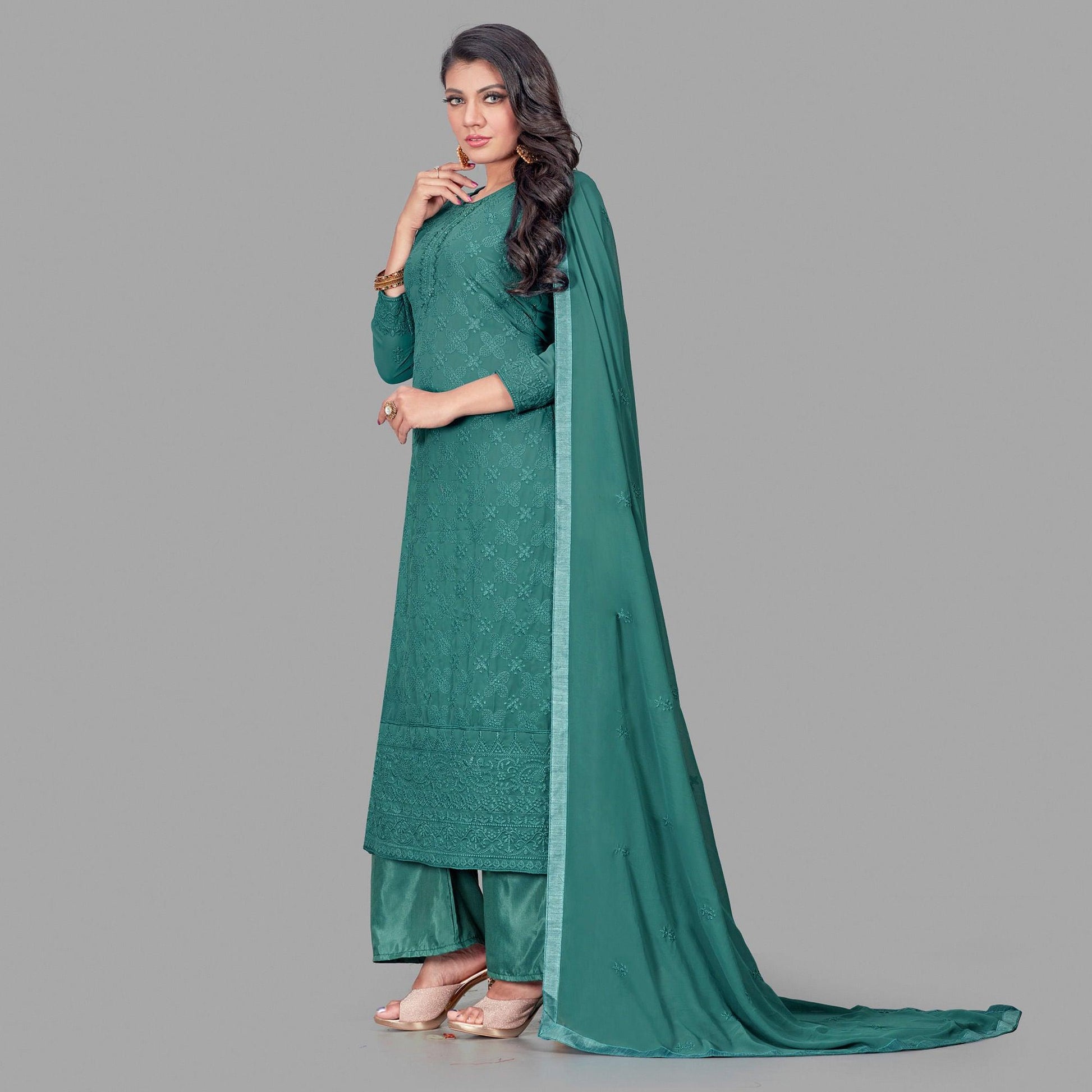 Flamboyant Dark Green Colored Partywear Embroidered Heavy Faux Georgette Palazzo Suit