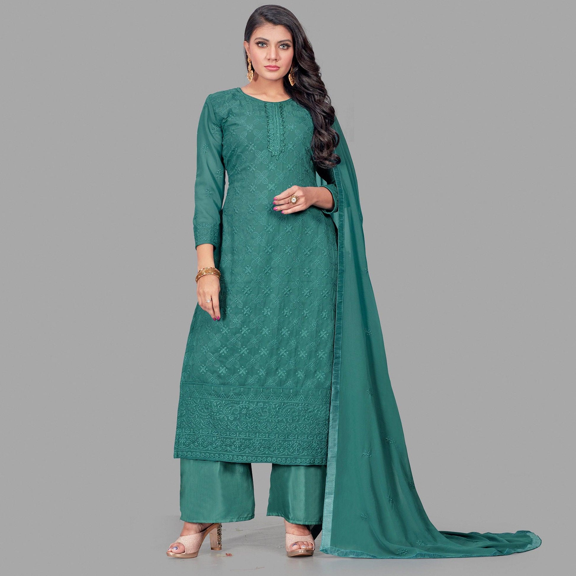 Flamboyant Dark Green Colored Partywear Embroidered Heavy Faux Georgette Palazzo Suit