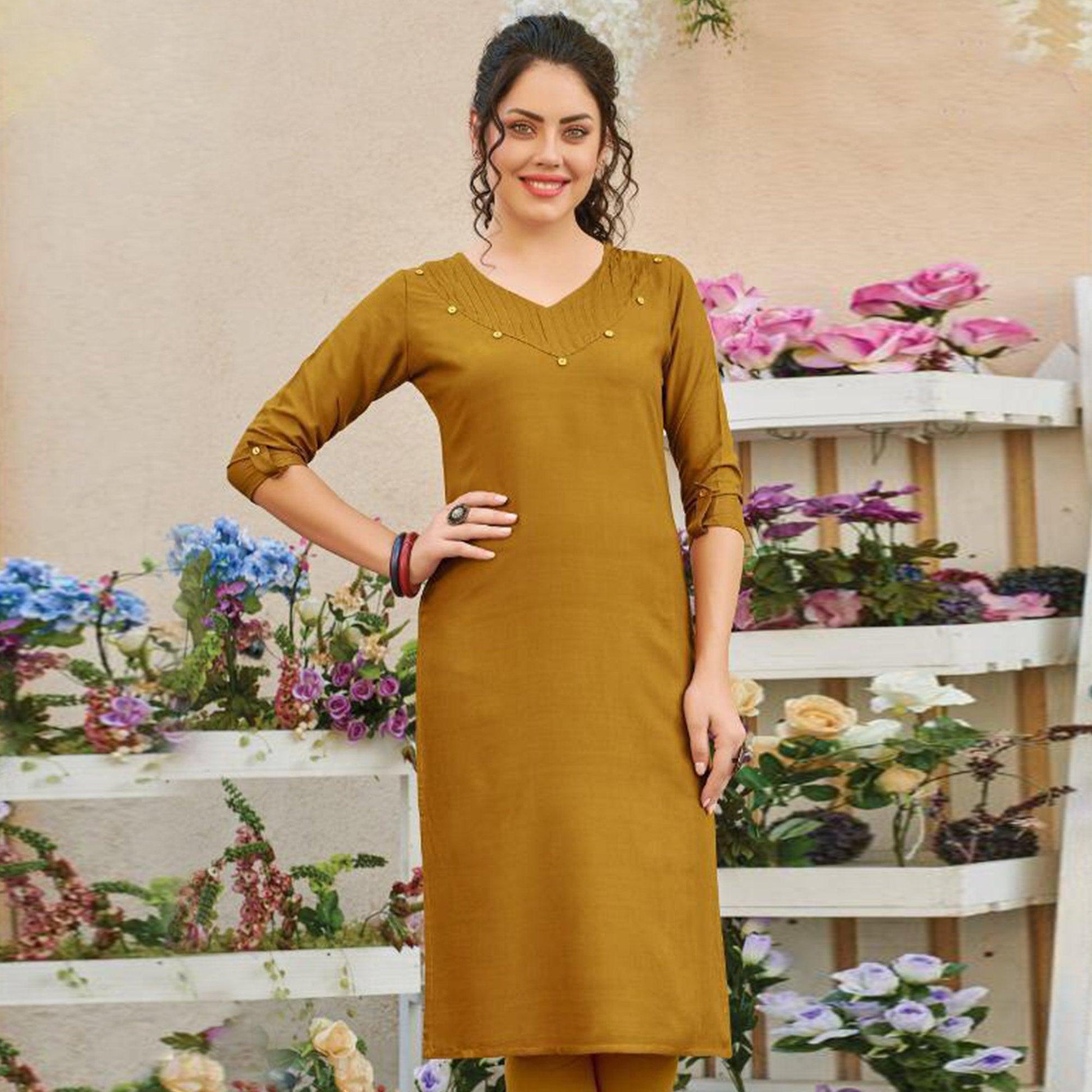 Flamboyant Mustard Yellow Colored Casual Wear Solid Pure Rayon Kurti