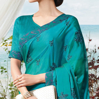 Flamboyant Rama Blue Colored Partywear Embroidered Georgette Saree