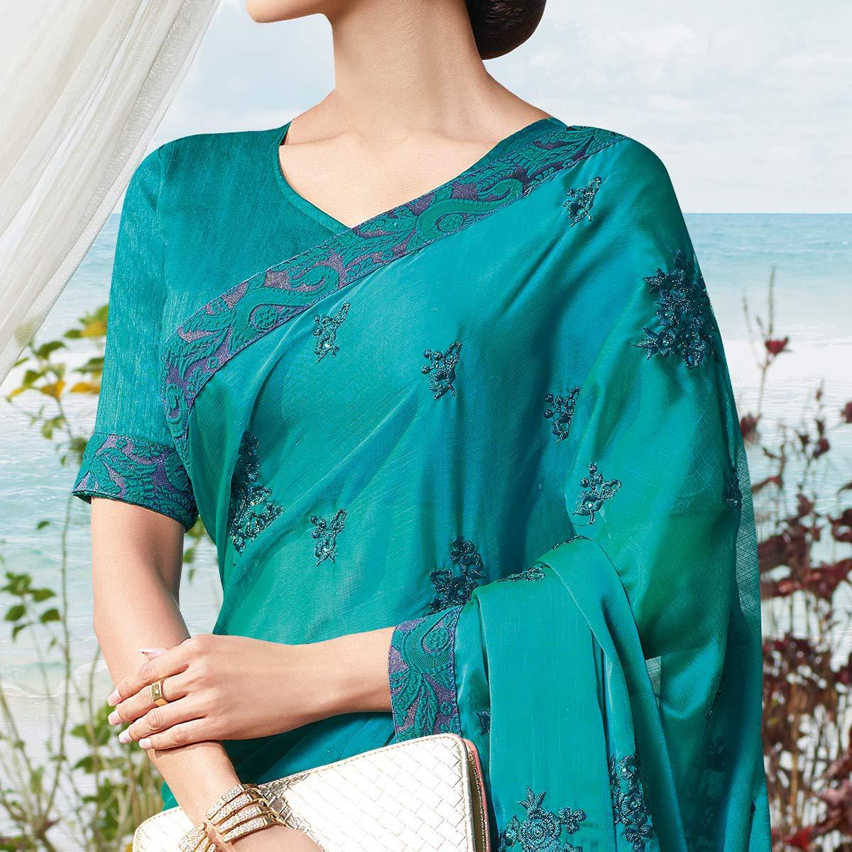 Flamboyant Rama Blue Colored Partywear Embroidered Georgette Saree