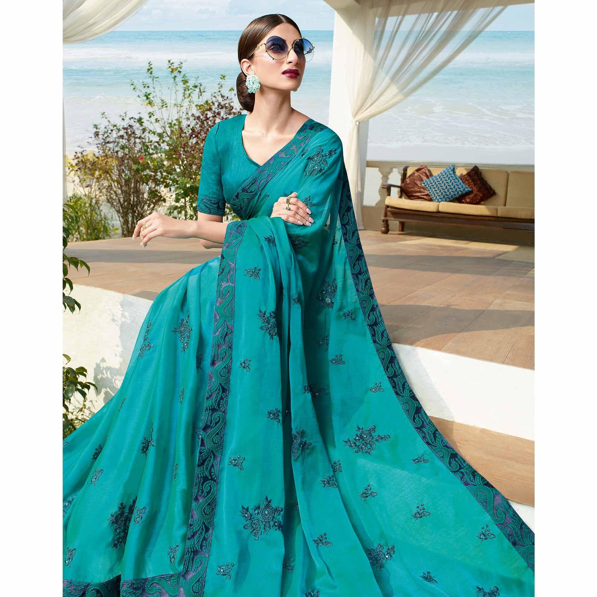 Flamboyant Rama Blue Colored Partywear Embroidered Georgette Saree