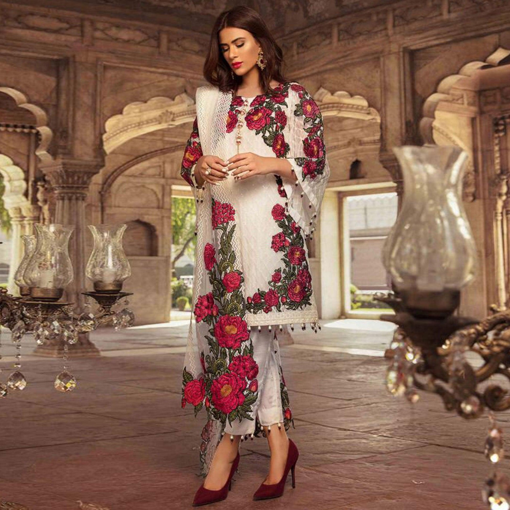 Flamboyant White Colored Partywear Embroidered Georgette Pant Style Suit