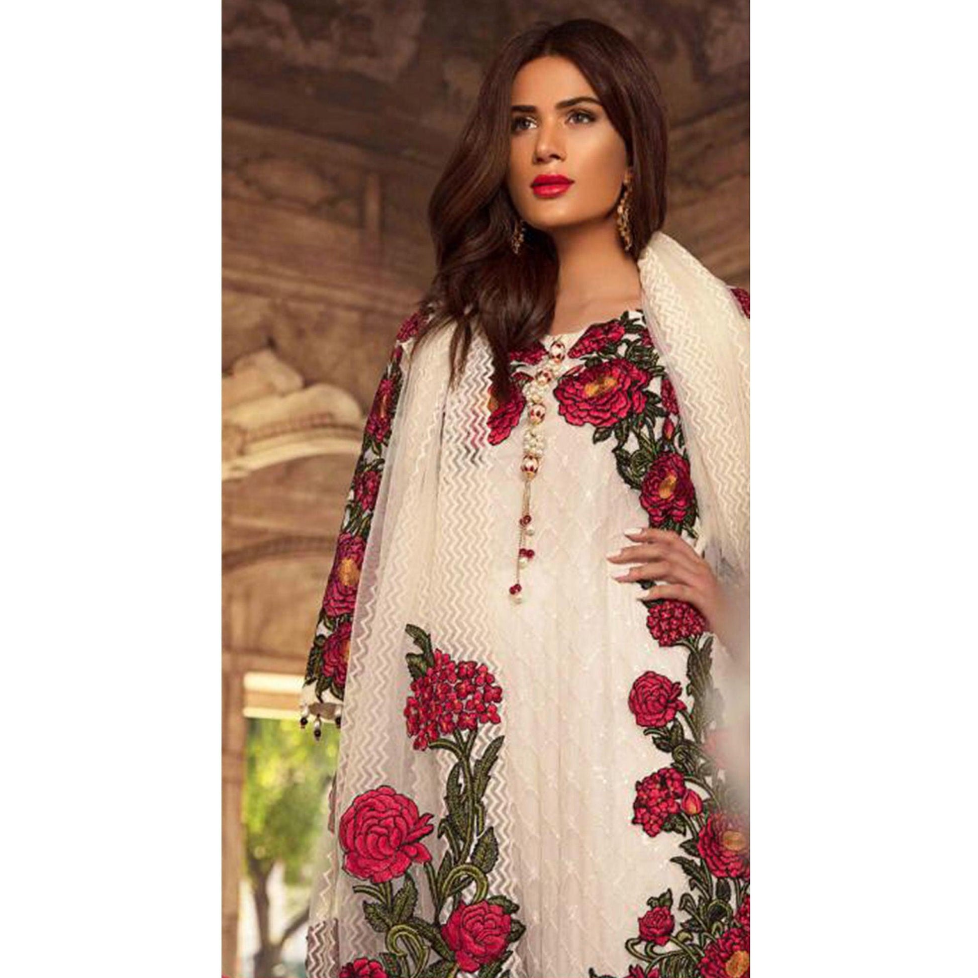 Flamboyant White Colored Partywear Embroidered Georgette Pant Style Suit