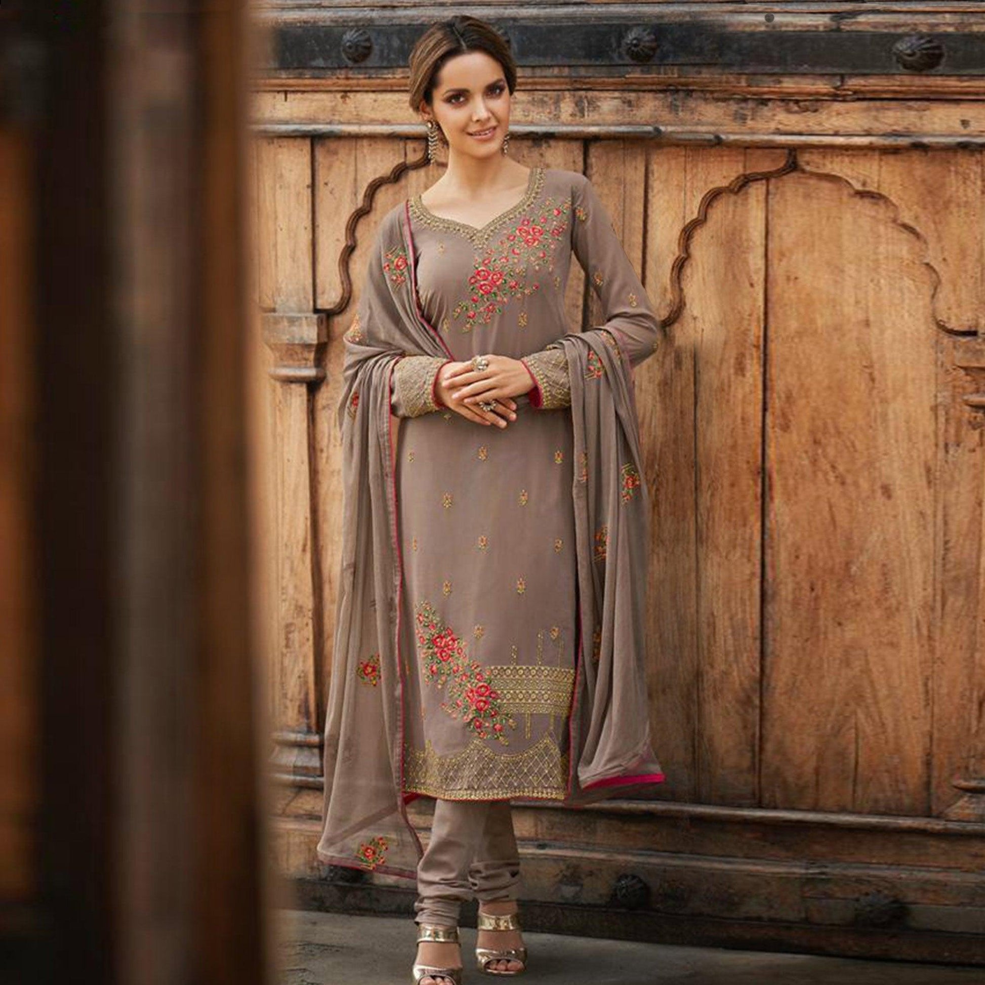 Flattering Beige Colored Partywear Embroidered Faux georgette Salwar Suit