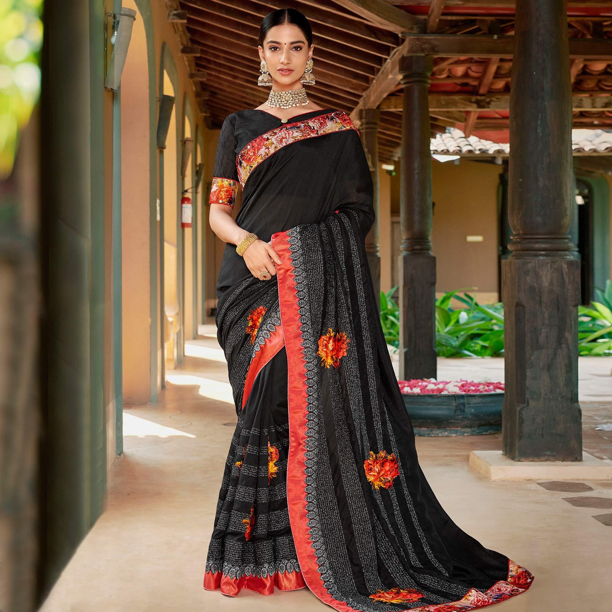 Flattering Black Colored Partywear Embroidered Art Silk Saree