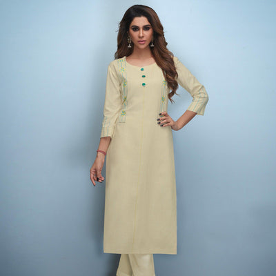 Flattering Cream Colored Partywear Embroidered Rayon Kurti