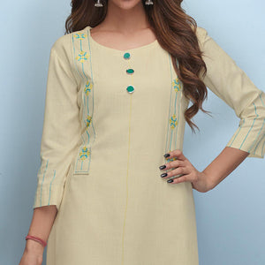 Flattering Cream Colored Partywear Embroidered Rayon Kurti