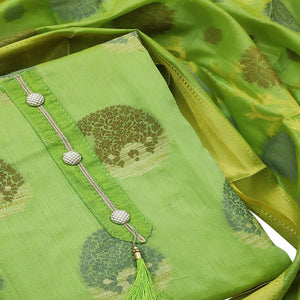 Flattering Green Colored Festive Wear Woven Heavy Banarasi Silk Dress Material