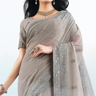 Flattering Grey Colored Partywear Embroidered Georgette Saree