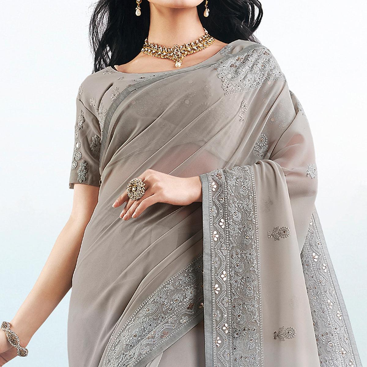 Flattering Grey Colored Partywear Embroidered Georgette Saree
