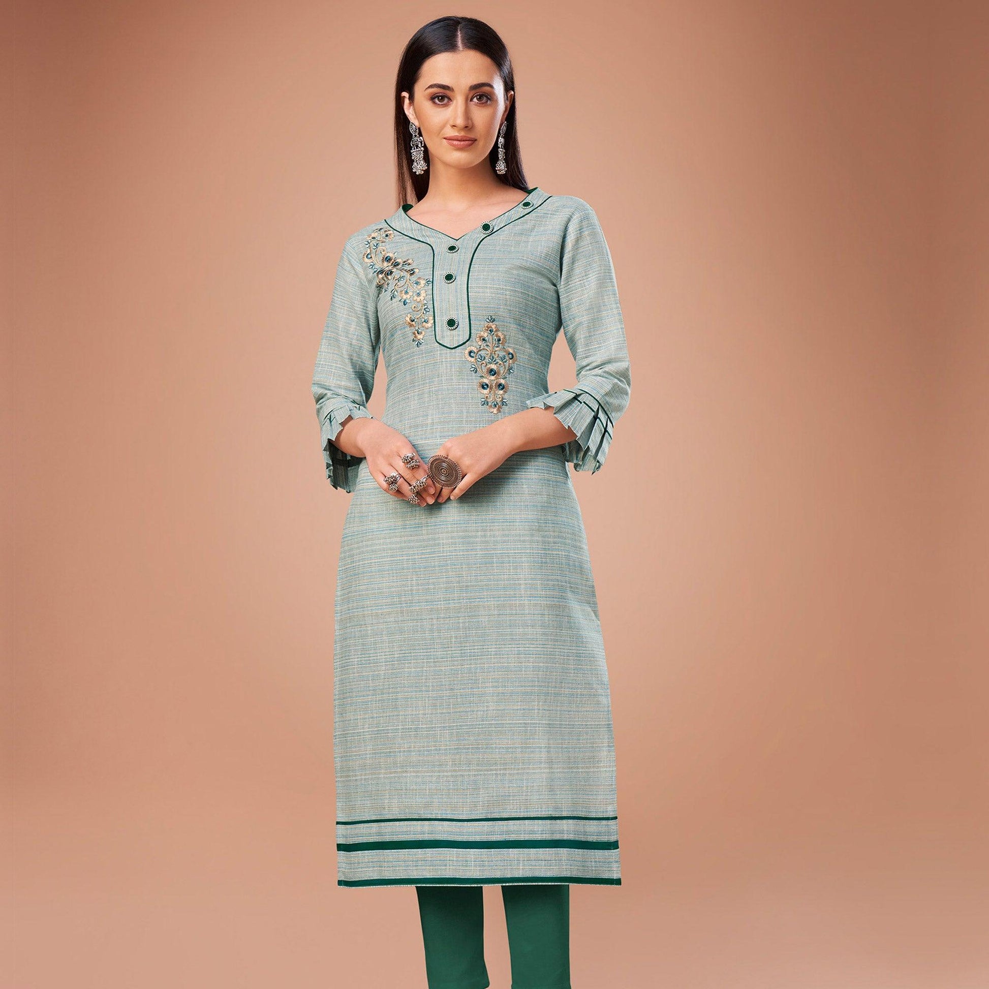 Flattering Light Blue Colored Partywear Embroidered Cotton Kurti