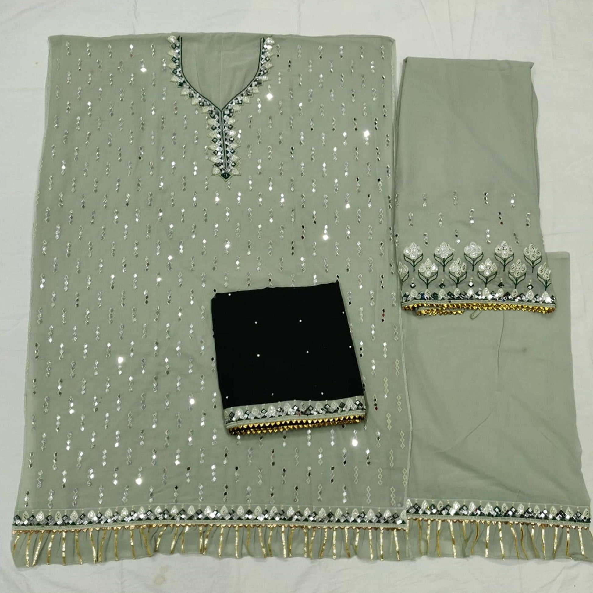 Flattering Pastel Green Colored Partywear Embroidered Georgette Palazzo Suit