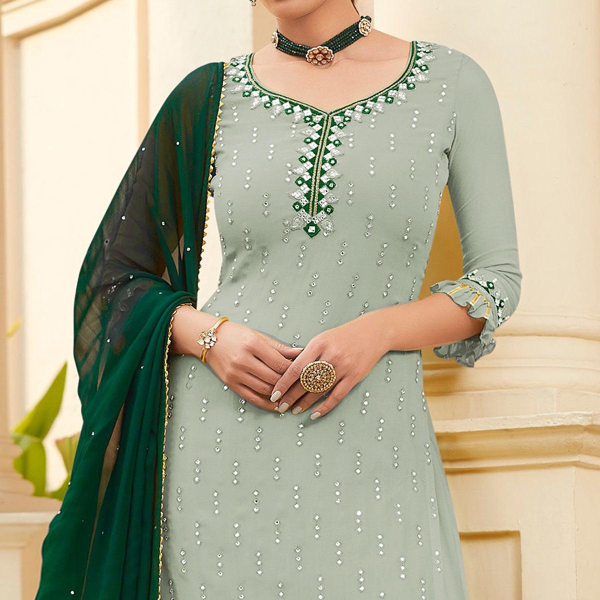 Flattering Pastel Green Colored Partywear Embroidered Georgette Palazzo Suit