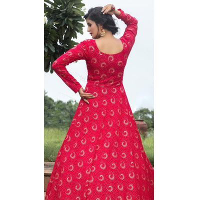Flattering Pink Colored Party Wear Foil Printed Georgette Gown