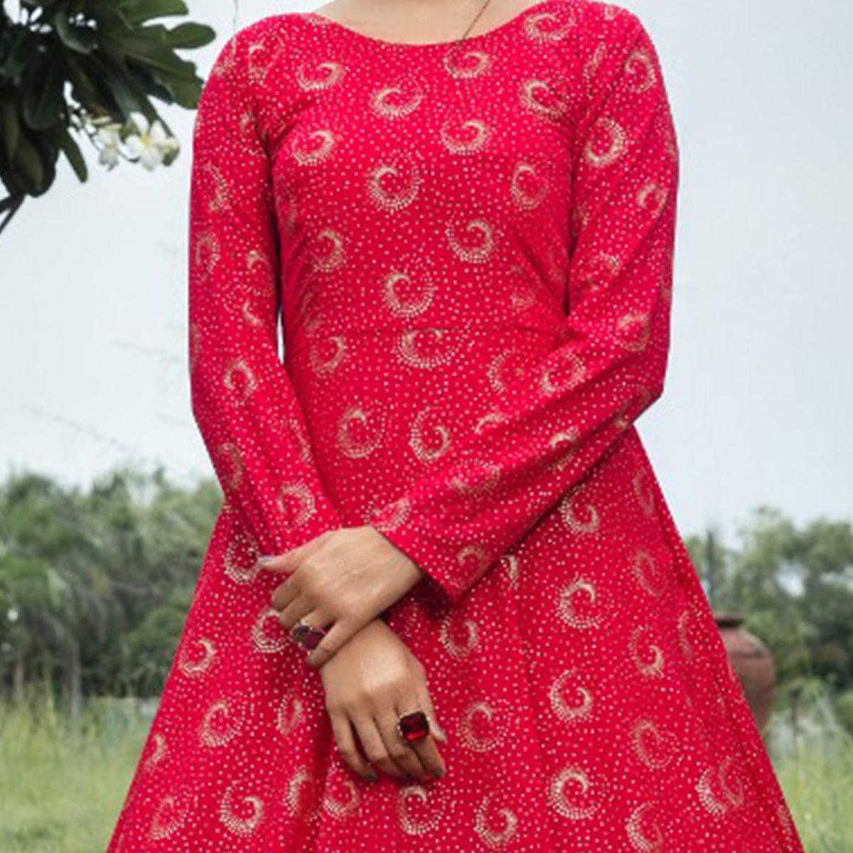 Flattering Pink Colored Party Wear Foil Printed Georgette Gown