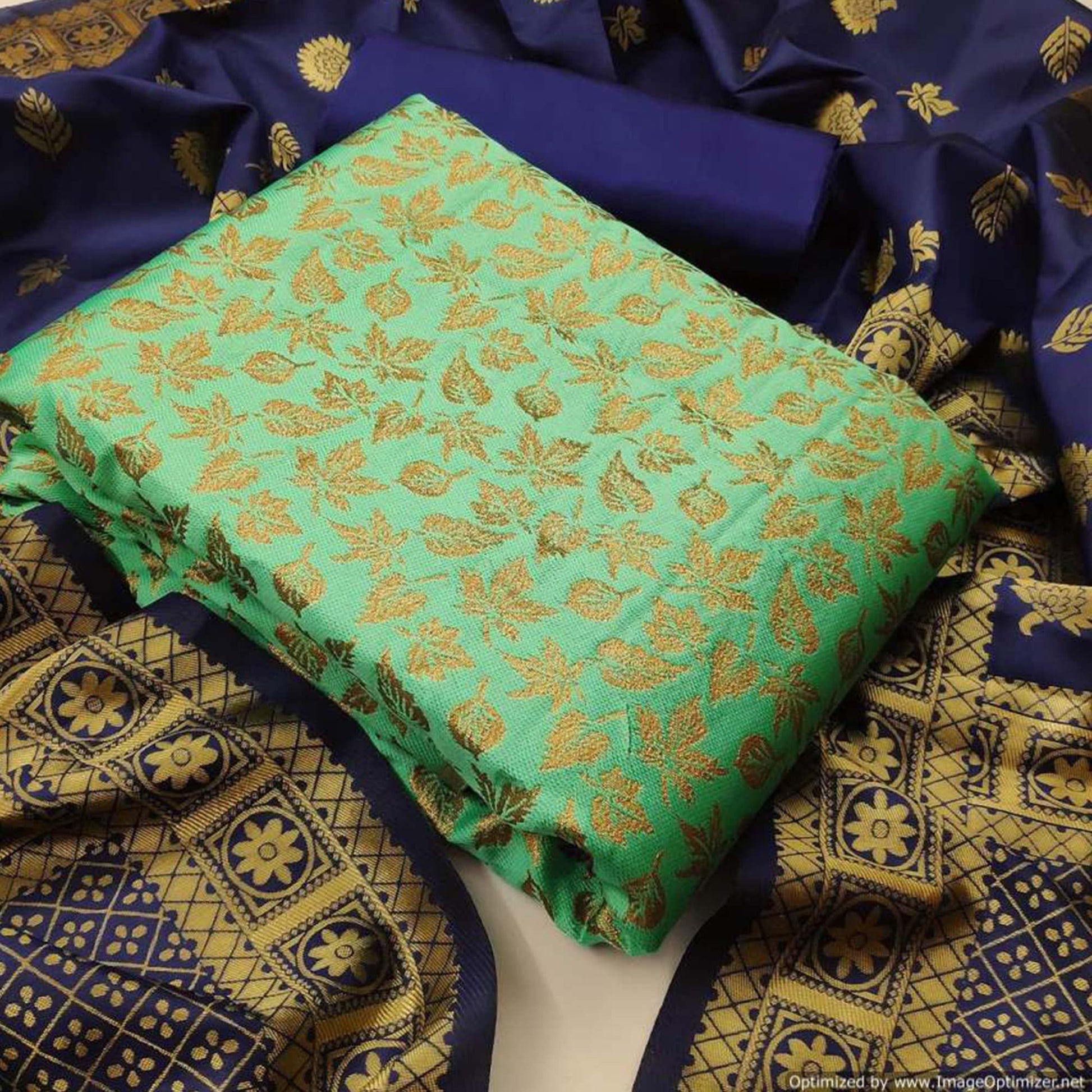 Flattering Sea Green Colored Casual Wear Banarasi Silk Dress Material