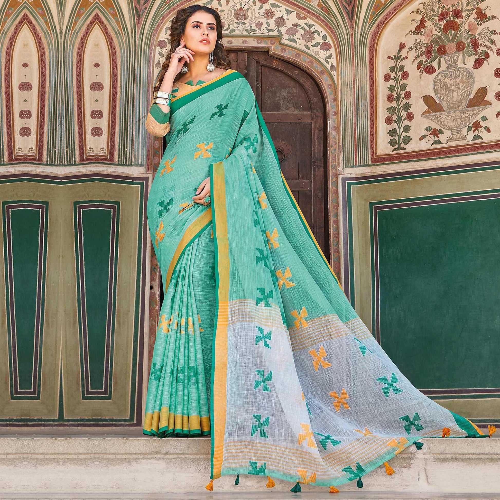 Flattering Turquoise Green Colored Casual Printed Linen Cotton Saree With Tassels