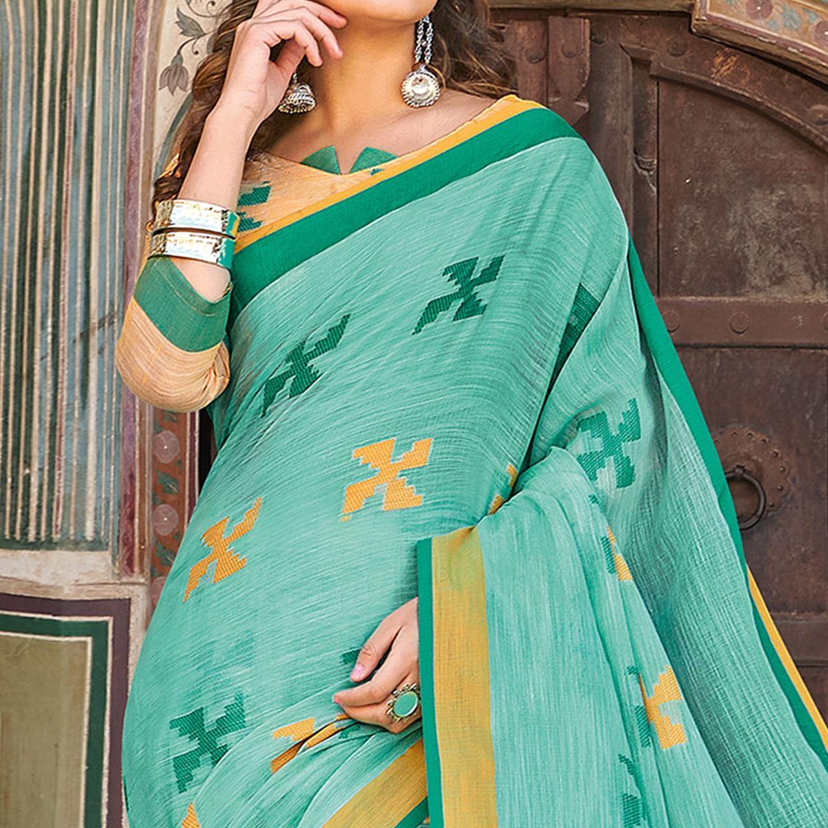 Flattering Turquoise Green Colored Casual Printed Linen Cotton Saree With Tassels